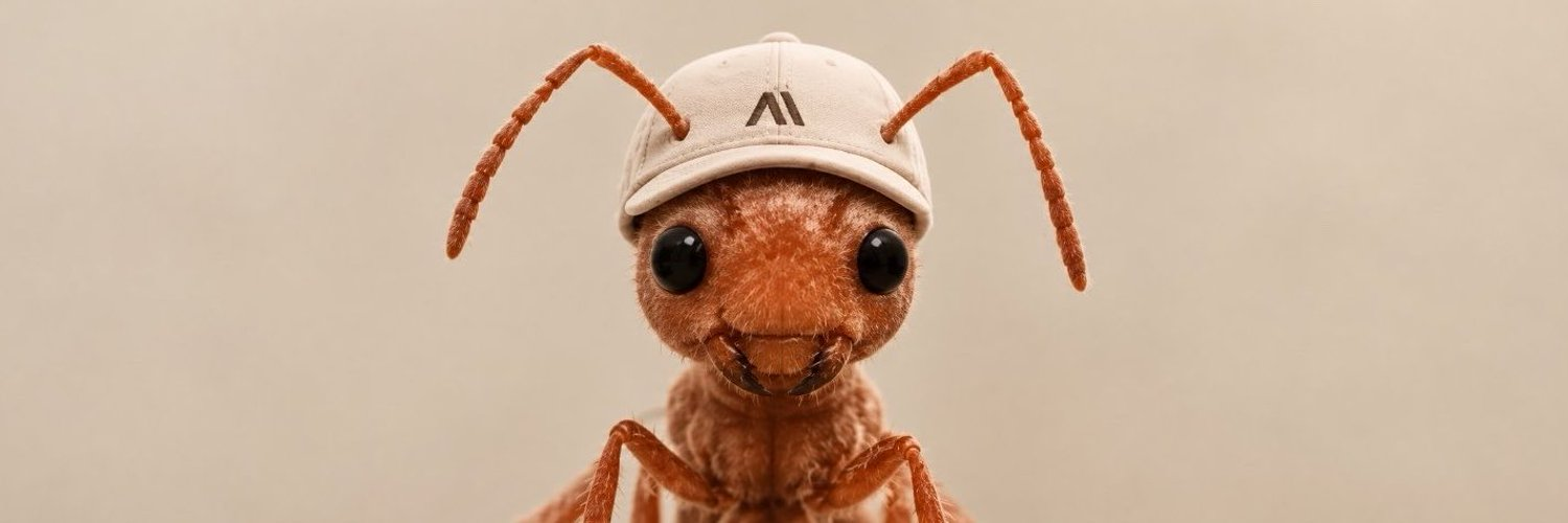 Anthropic banner, the ant in the beige cap